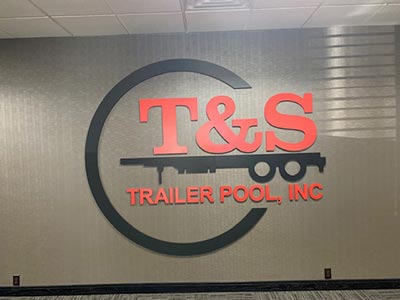 T and S sign with logo